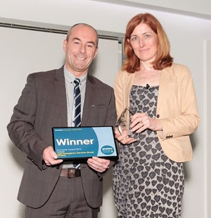 Helen Platts presents Exemplar Award to Tony Bracey - See more at: https://www.geoplace.co.uk/-/geoplace-announces-winners-of-2014-exemplar-awards#sthash.oGdzpCe3.dpuf